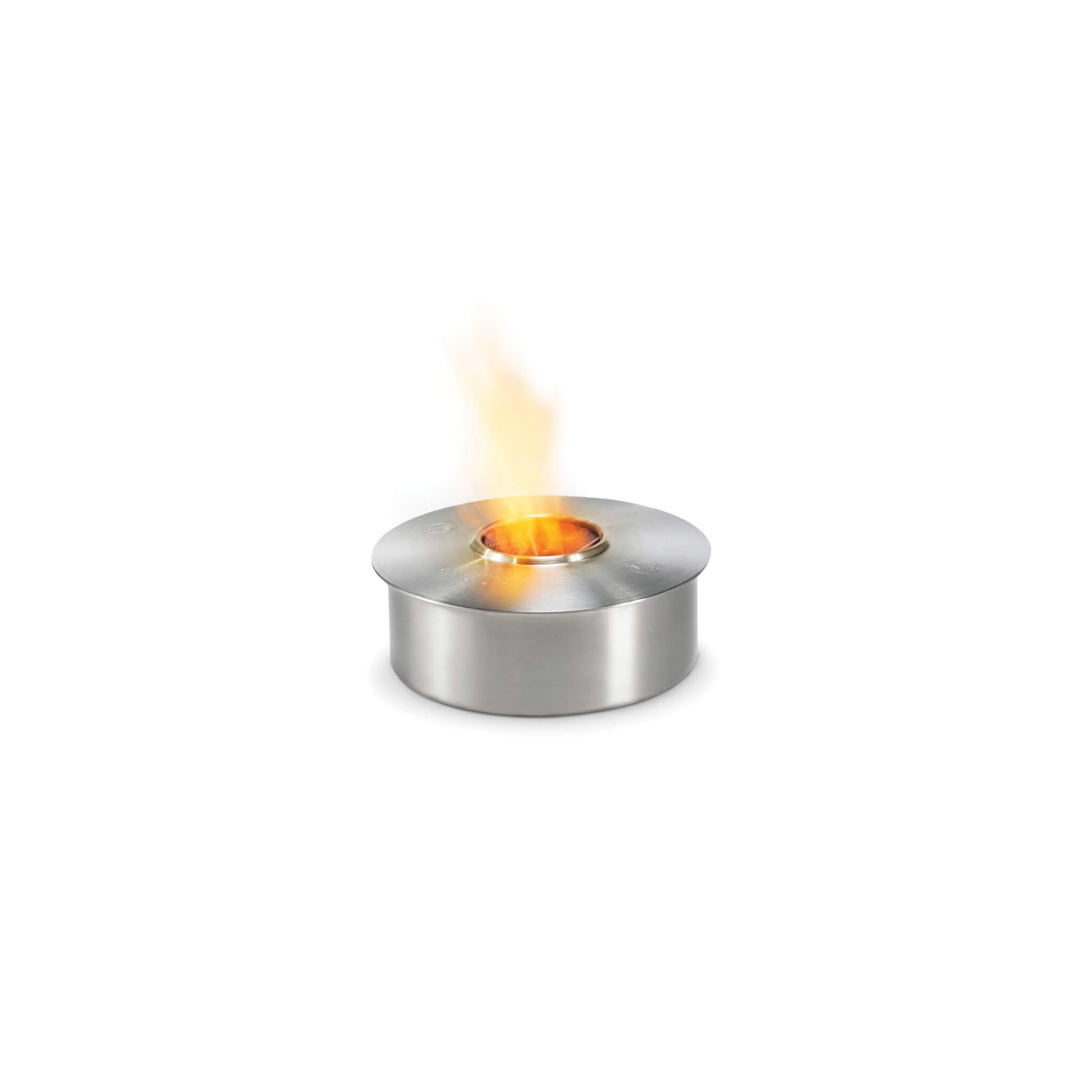 Stainless steel tealight holder with flame on a white background