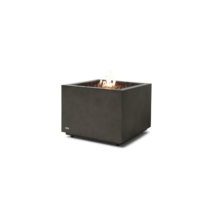 Square concrete fire pit with flames on a white background