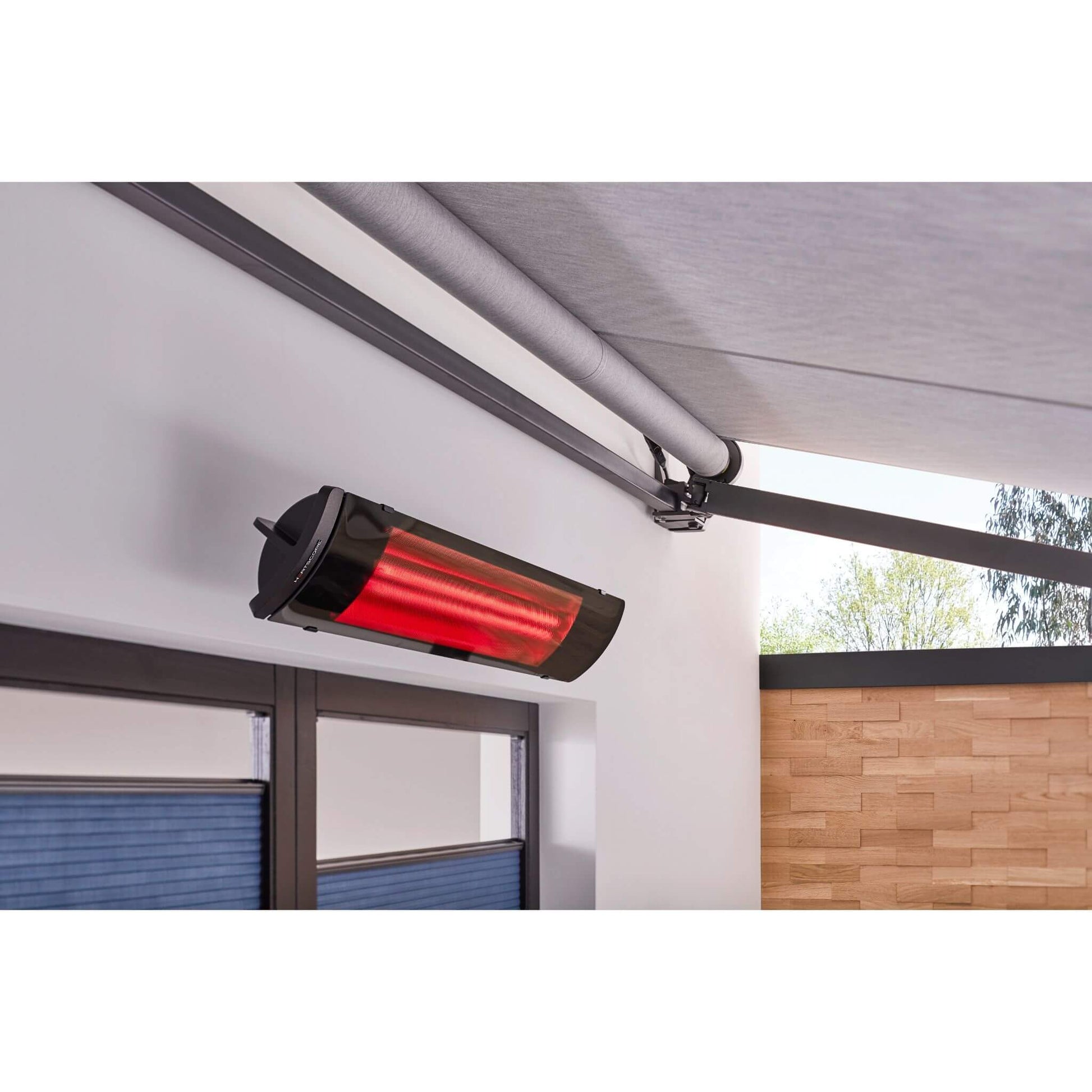 Heatscope PURE radiant 24kW / 30kW infrared wall-mounted electric heater on patio in black